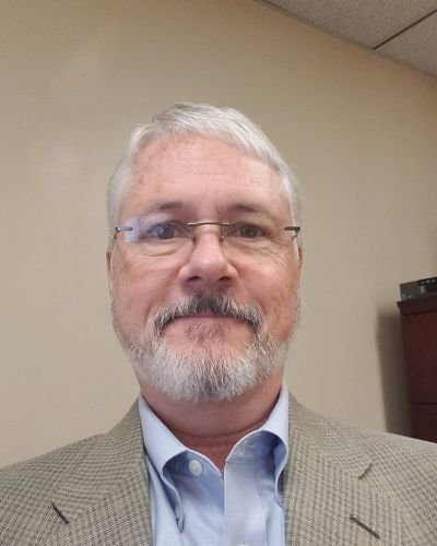 Headshot of Jon James