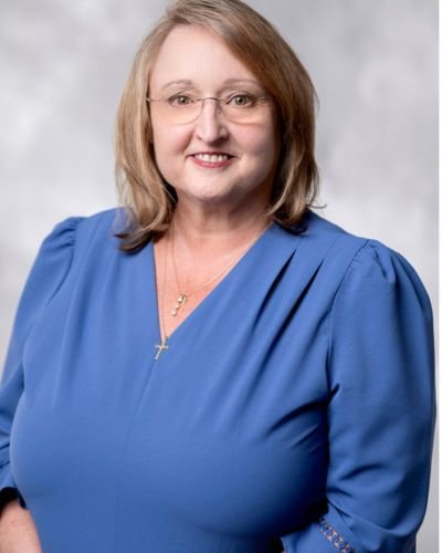 Headshot of Emily Jones, PMP, CISM, CMMC