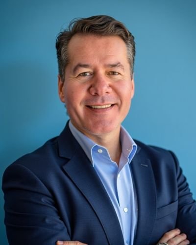 Headshot of Travis O'Neil