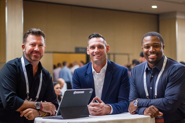 Attendees around a table at a TribalHub event