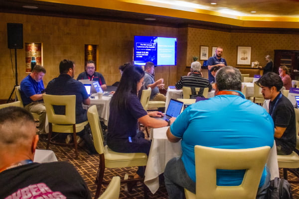 Participants working on a cybersecurity CTF exercise